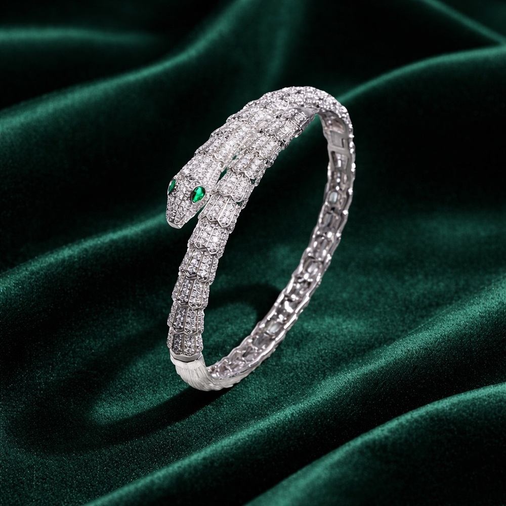 Silver Snake Bracelet with Green Eyes